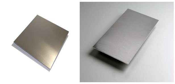 An image showing both 3003 aluminum and 6061 aluminum sheets