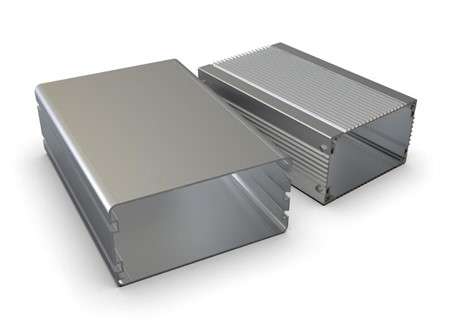 two Enclosures from aluminum sheet placed on a desk