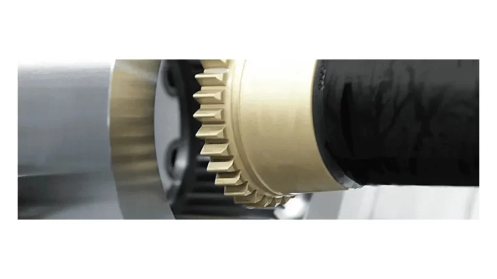 The image of gear cutter with multiple cutting teeth designed for shaping gears.