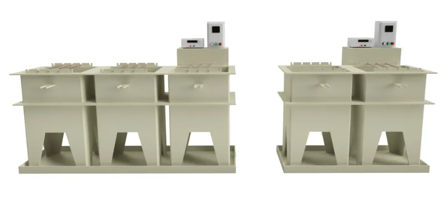 A side-by-side view of two large, tan-colored multi-compartment industrial processing tanks used for chemical immersion.