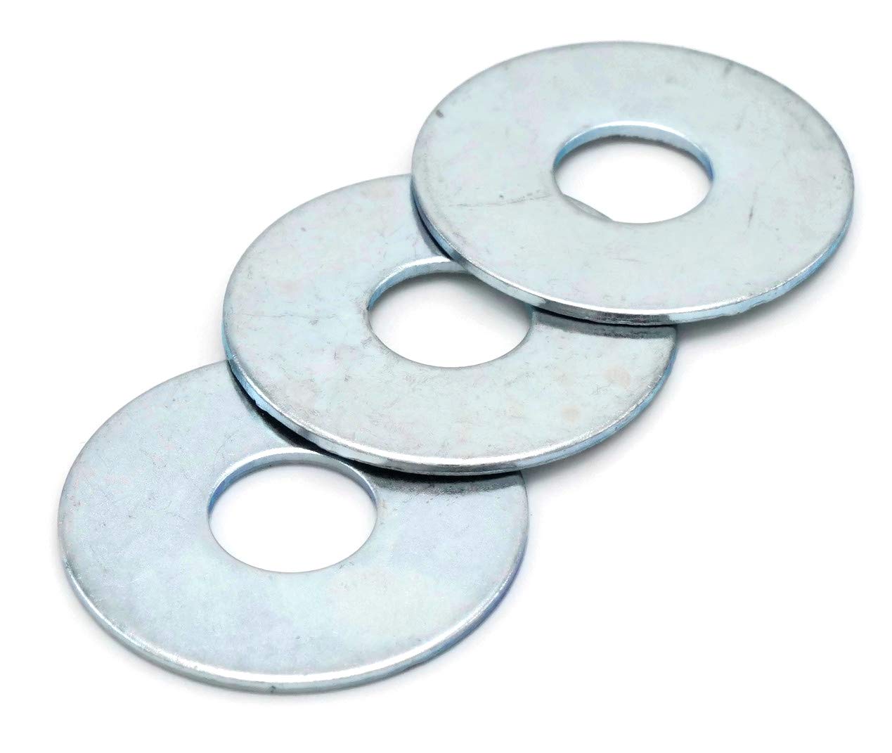 Three fender washers on a white background.