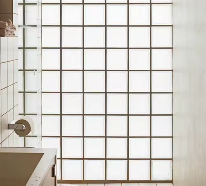 An image of a translucent bathroom window made of frosted acrylic allowing in diffuser light