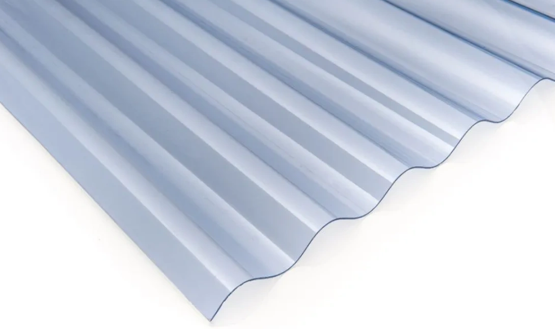 An image of a light blue translucent corrugated sheet of polycarbonate on a white background 