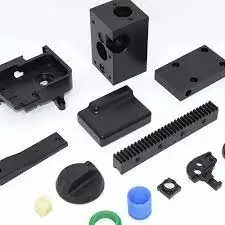 Various custom-machined plastic components for industrial use.