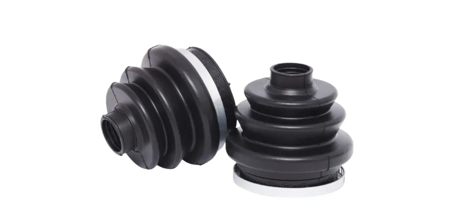 Two black rubber axle bellows, or CV boots, demonstrating a flexible part typically created through specialized molding.