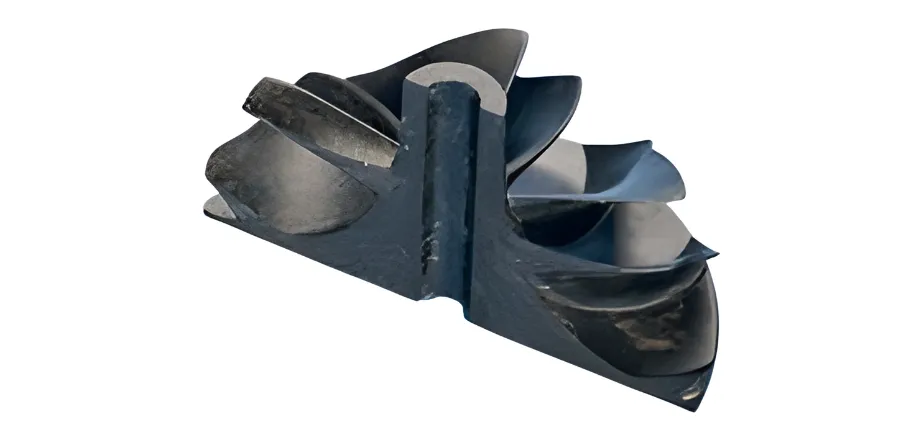 A cross-section of a black compression-molded impeller showing the dense internal structure and curved blade geometry.