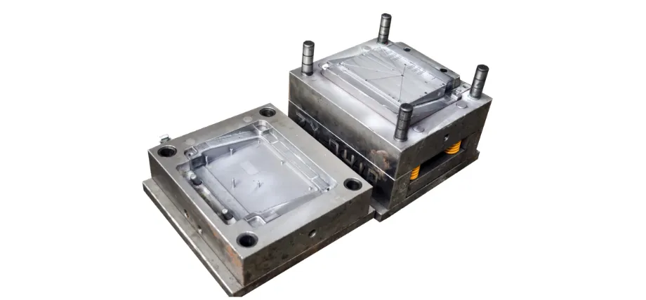 Heavy-duty steel injection molding tool set shown in the open position, revealing the cavity and core plates.