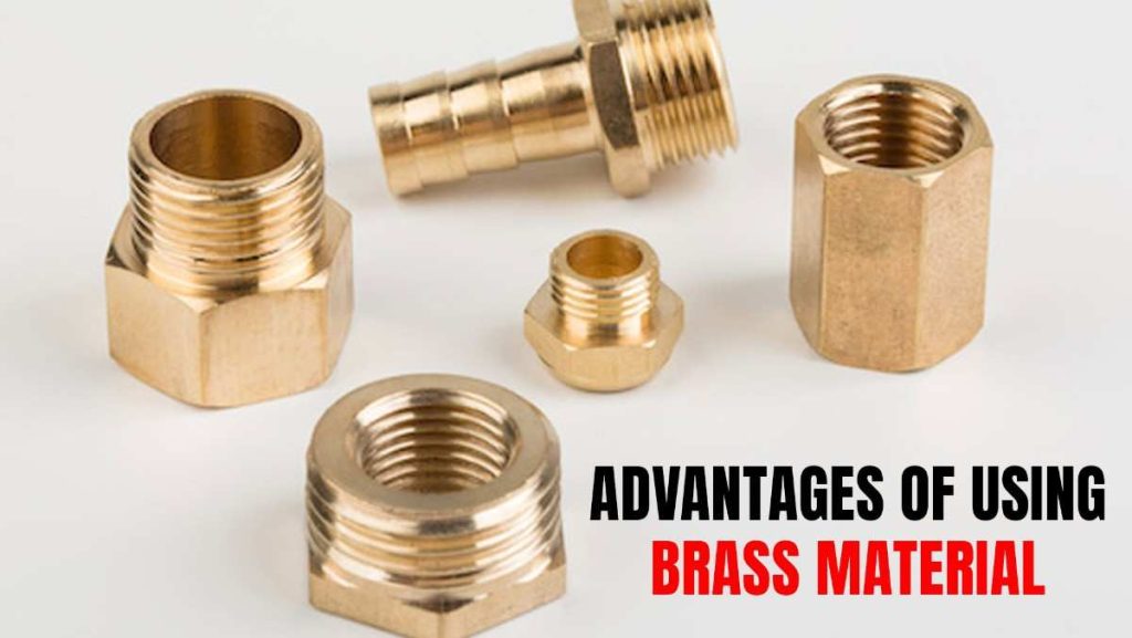 Several shiny brass fittings on a light background.