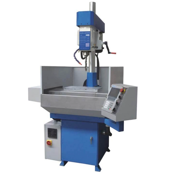An image of an example of a CNC drill, blue and white  