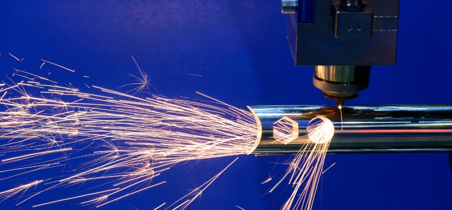 Laser cutting through metal with metal spark