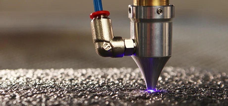 Close up of laser etching tool