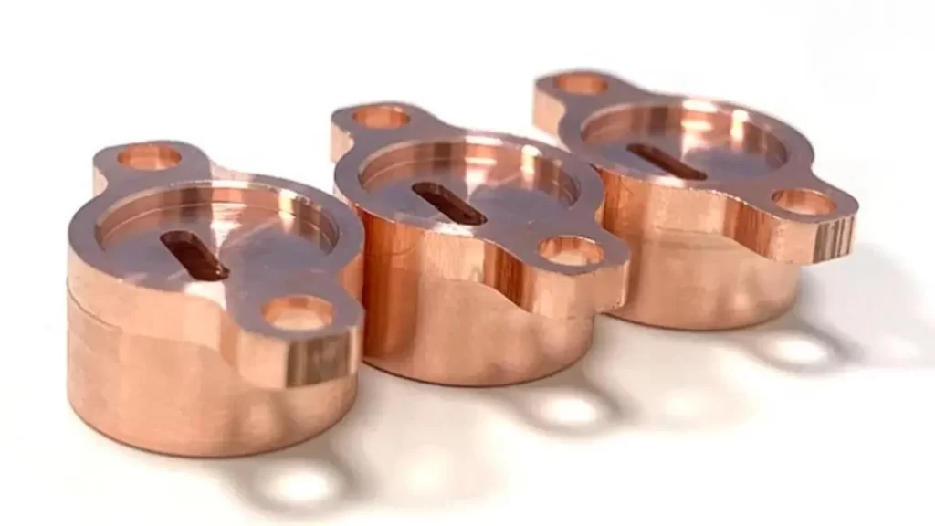 Parts with copper plating, showcasing a bright, and reddish finish.