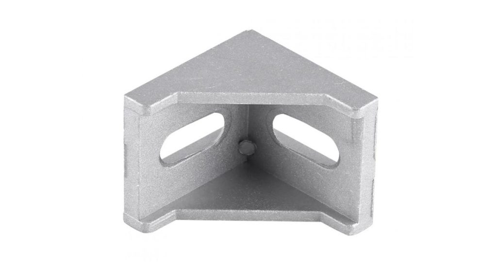 An image of L-shaped aluminum bracket. It featuring a right angle with a smooth, metallic finish and pre-drilled holes for mounting.