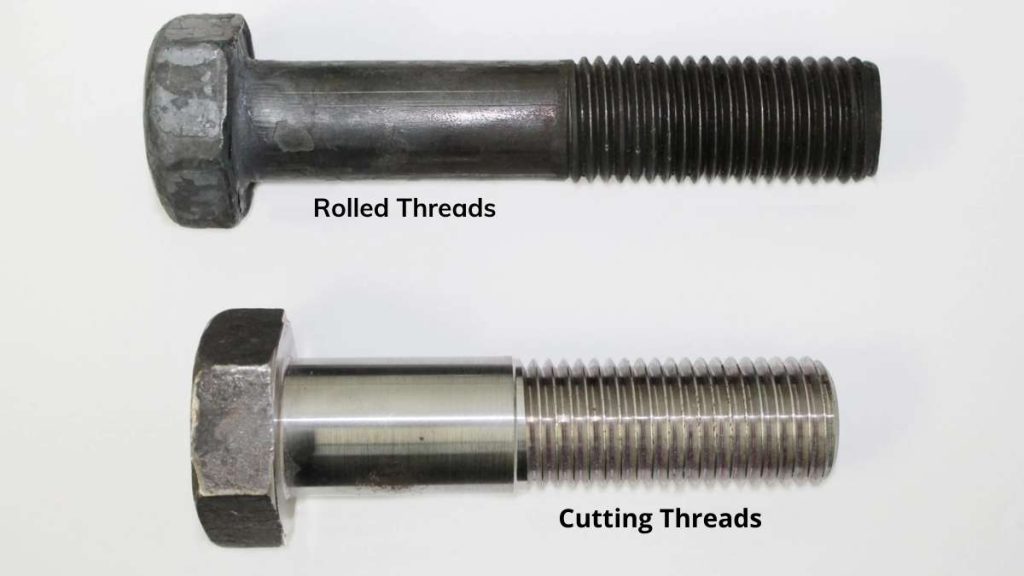 An illustration comparing rolled threads and cut threads, showcasing the differences in their formation process and appearance.