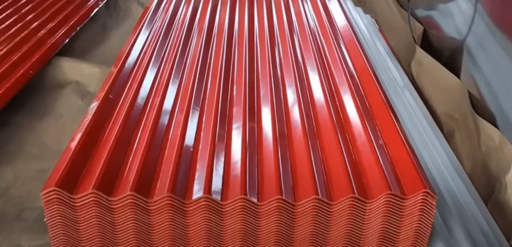 An image of red colored galvanized steel roof sheets