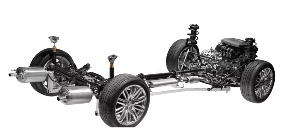 Car chassis framework highlighting major components including suspension and drivetrain.  