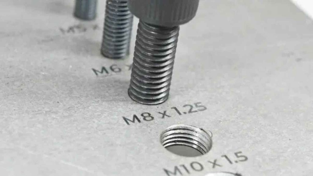 A metal part with precisely placed holes, showcasing accurate positioning/alignment in the machining process.