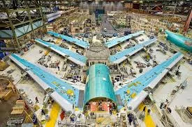 Inside an advanced aircraft manufacturing facility, highlighting the critical role of annealing processes in aerospace innovation.