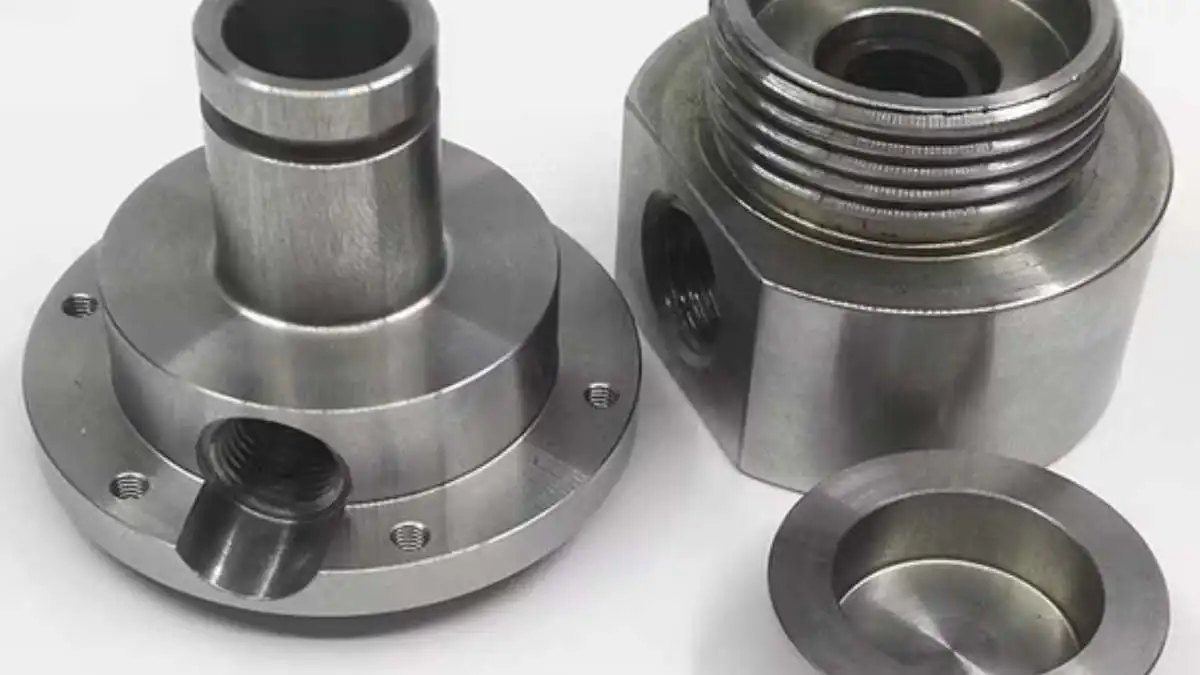 A group of automotive CNC machined parts with fine machined faces and deburred edges