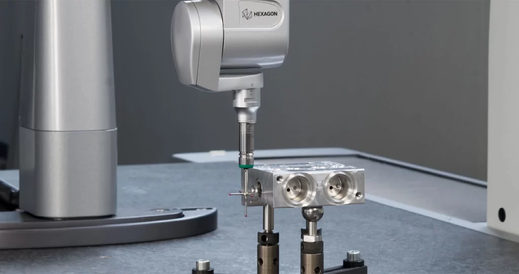 A CMM machine measuring the hole dimension with probe