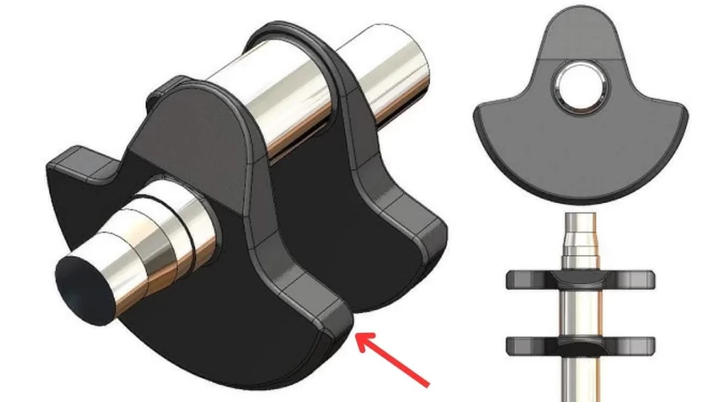 The image shows the counterweights of a crankshaft, designed to balance the rotating assembly.