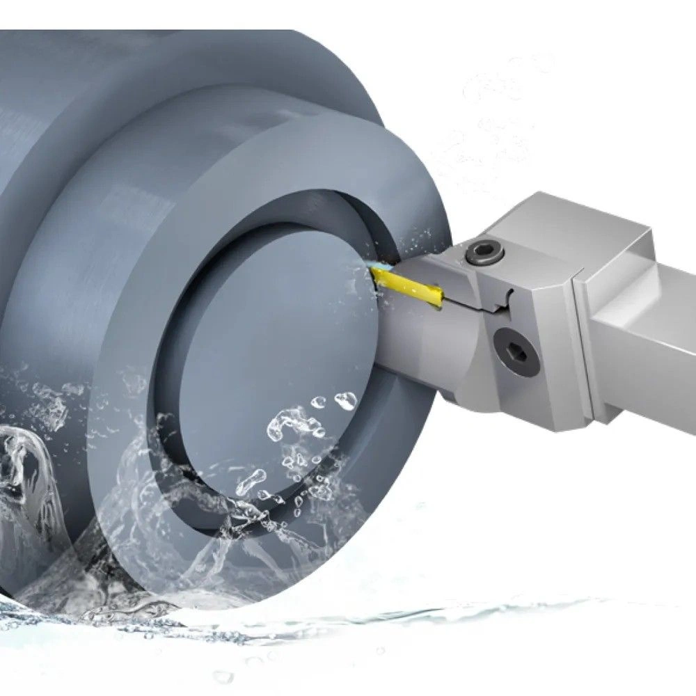 A grooving tool machining a groove on the face of a workpiece