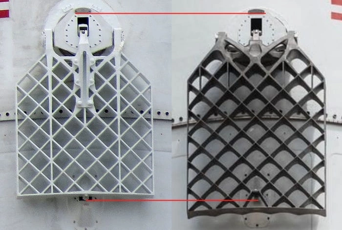 A close view of image showing two white and black colored grid fins used in SpaceX Falcon 9 