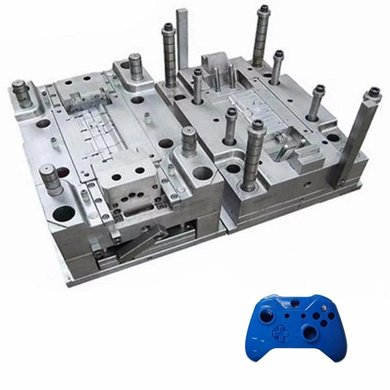 An open view of Mold for game controller housing  and molding result 