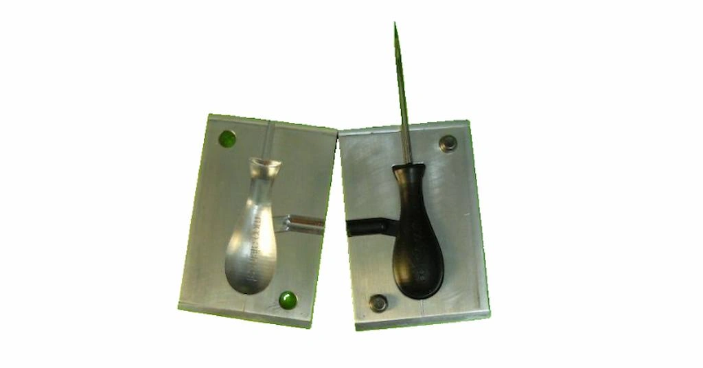 An image of single cavity overmold, showing two halves. 