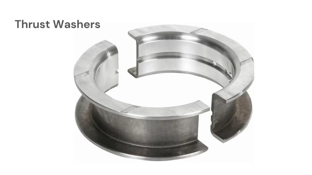 The image shows the thrust washers. These are flat circular components that normally help to reduce the friction between crankshaft moving parts.