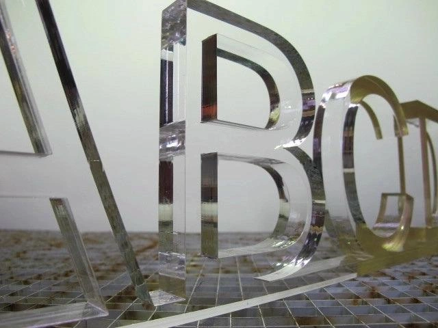 Acrylic laser cut signage example, 3D lettering A, B, C, D in a close frame