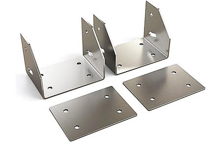 Two stainless blanks and corresponding stamped mounts for aerospace application