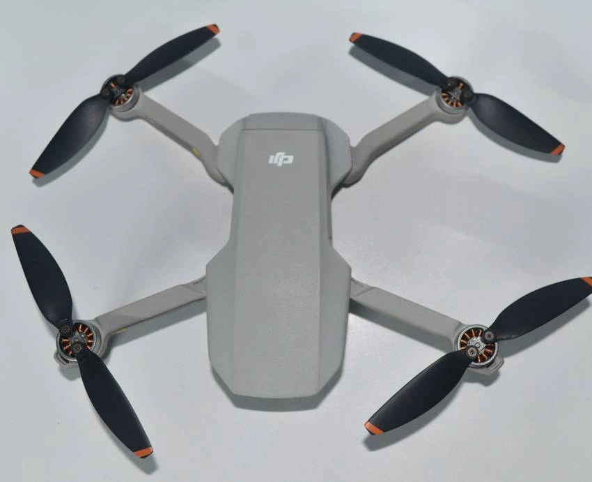 An image of a drone with four rotors, each with two wings