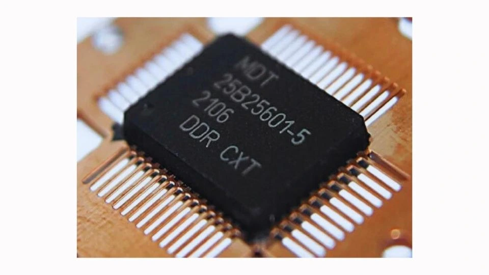 Alt text: A detailed view of a laser-marked PCB chip showing a code with clear and high-contrast markings