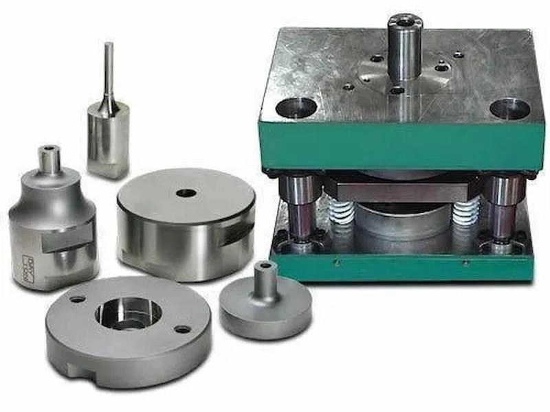 Punched metal parts and die setup on the side 