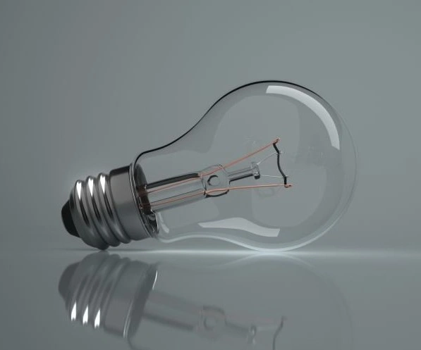 A tungsten bulb placed on a reflective surface