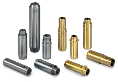 Tubular components of different sizes and colors arranged on a surface