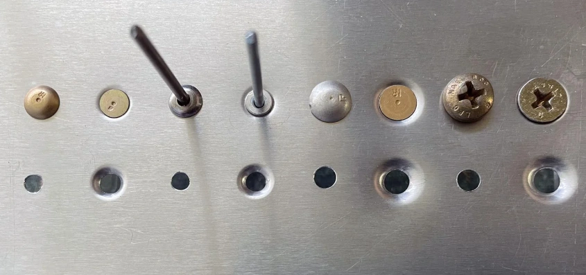 A picture showing different ways of installing fasteners on a metal surface