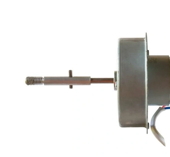 A slender threaded motor shaft connected to a circular device in a cover