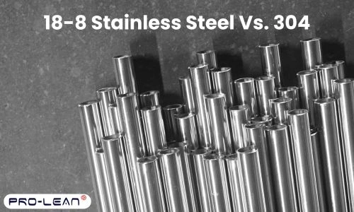 A group of stainless steel shafts in a factory