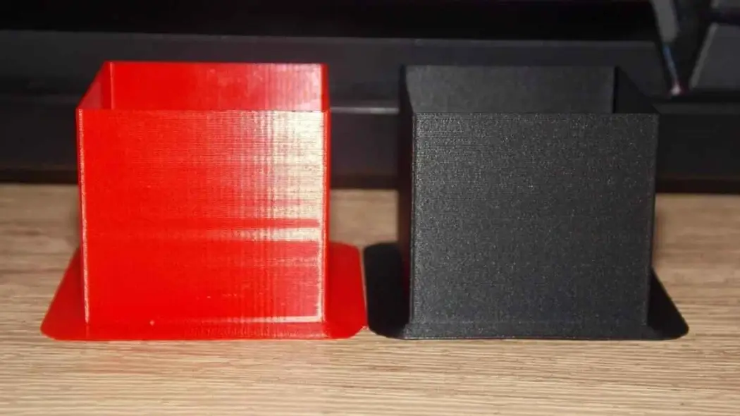 A matte-finished ABS plastic part with a uniform, low-sheen surface