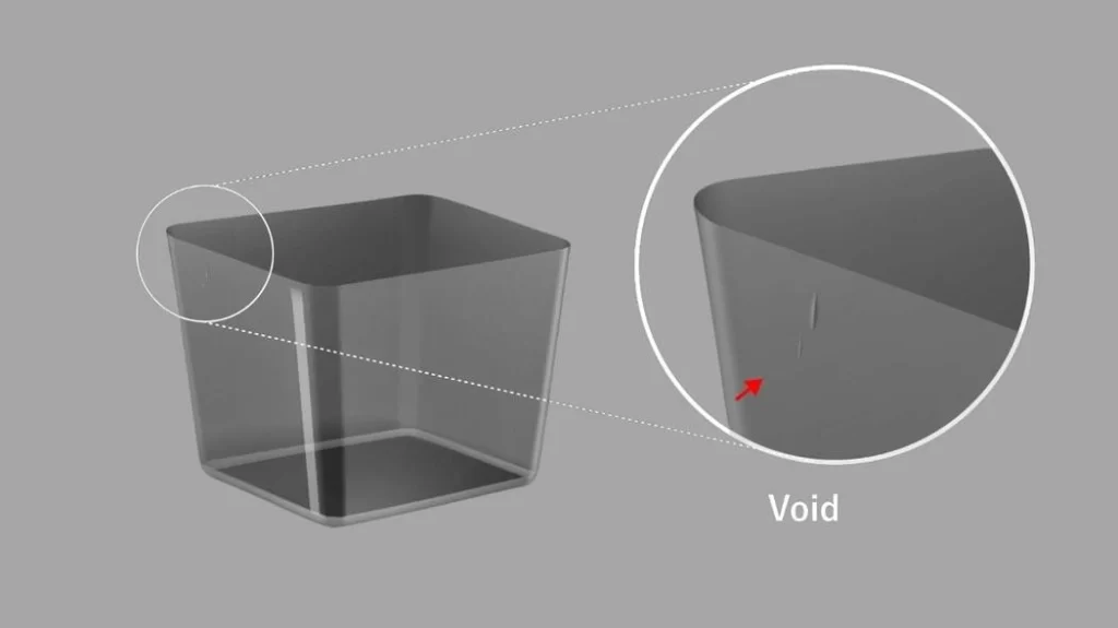 An image of an injection-molded part with a highlighted area showing void formation. It depicts internal defects caused by improper material flow