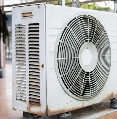 An image of an outdoor AC unit showing hemmed edges