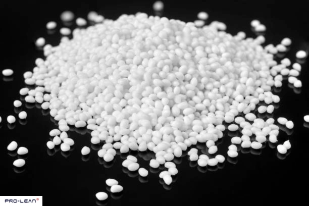 Close-up of many small, white TPE plastic granules.