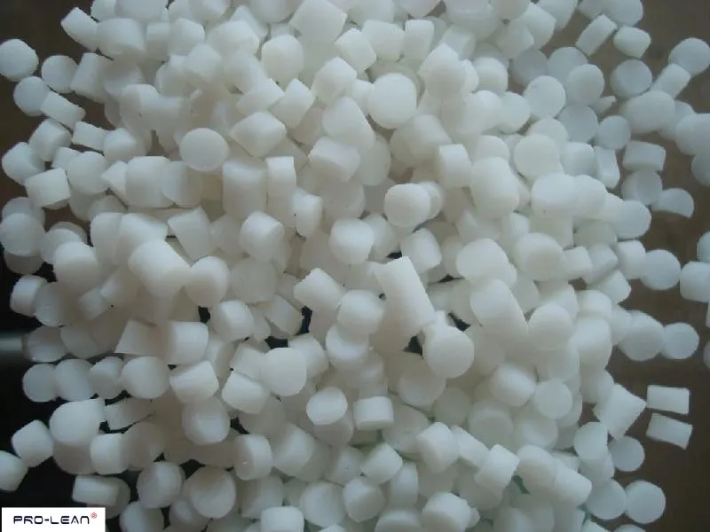Close-up of many small, white TPR plastic granules.