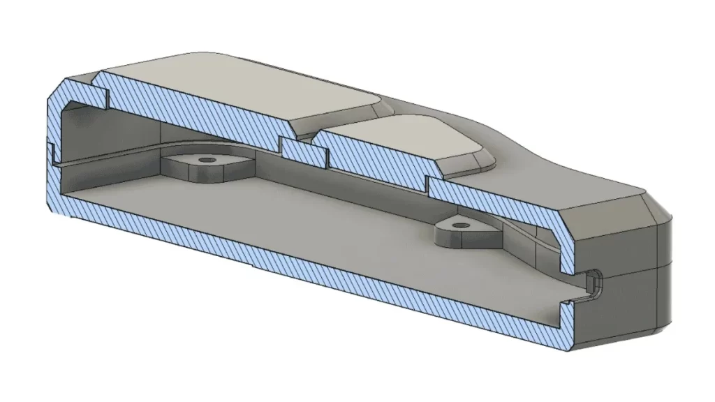 Plastic box design ready for molding, showing mounting areas and vents.