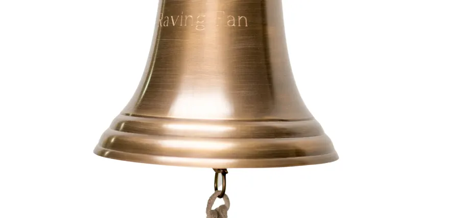 Bronze bell on a white background
