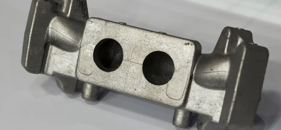 Die-cast aluminum with parting line visible 