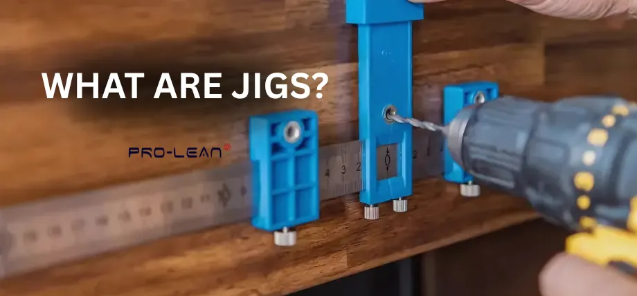 Blue dril jig on a wood surface with a handheld drill making hole with text on the side “What are Jigs?”