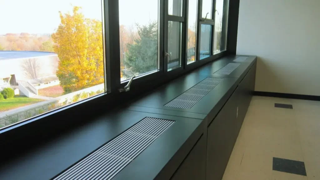 The image shows custom enclosures for the induction unit. The metal surfaces look precise and well-assembled, giving a neat appearance.
